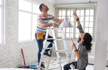 Husband and wife improving their home thanks to funds from a home equity loan