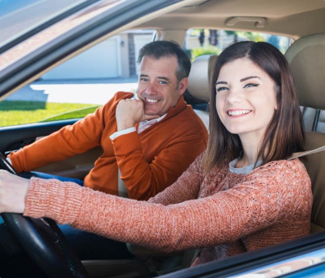 Daughter driving with father in her new car financed by an auto loan